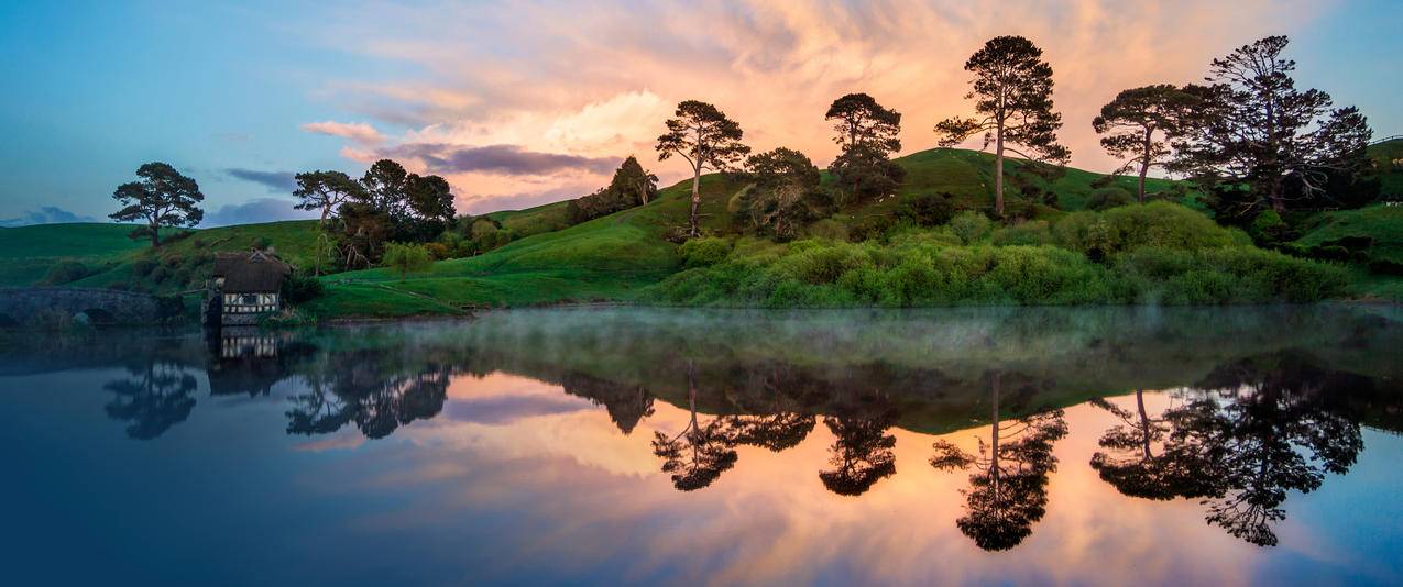 新西兰美丽迷人湖泊山脉带鱼屏高清壁纸
